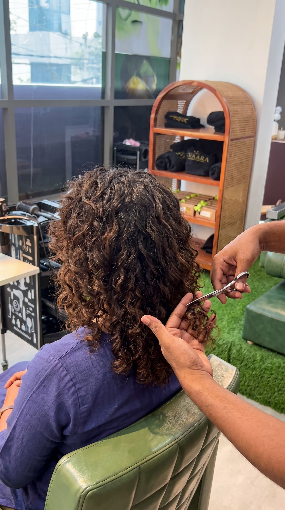 Curls being cut and shaped